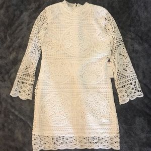 White lace cocktail dress great for semi-formal.
